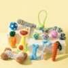 Bright and Fun Pet Chew Toys Collection Colorful pet chew toys in various shapes, including bones, carrots, balls, and ropes, designed for dogs and other pets.