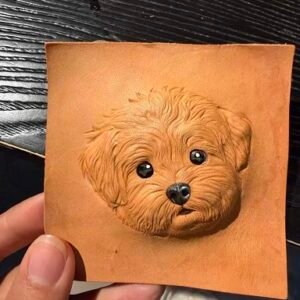 Custom pet leather carving step 2 defining darkest areas such as eyes nose and mouth