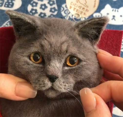 needle felting cat whiskers on custom felted pets, pet portraits from photos, handmade felt pets, custom felt pet portrait detail, artisan pet portrait creation