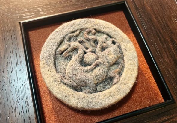 Antique Zizhou wool felt rug from China demonstrating ancient wet-felting durability techniques applied to modern needle felted pet memorial sculptures.