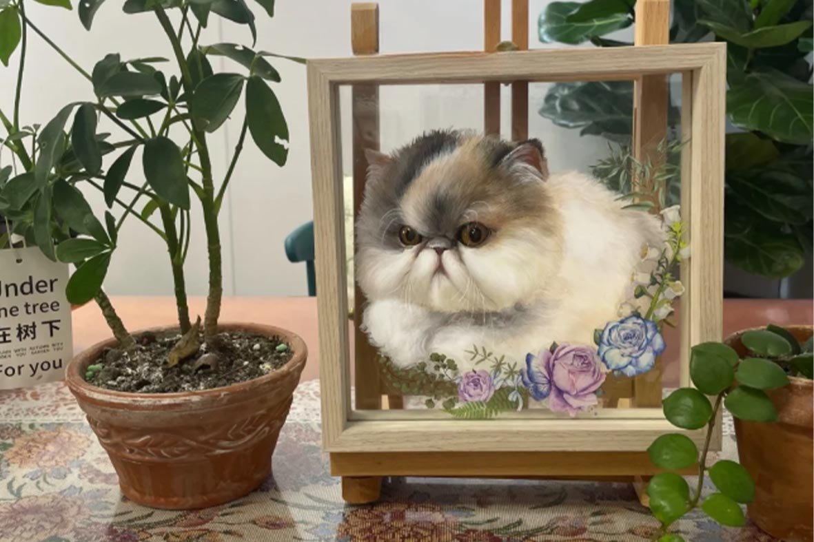 A minimalist pet memorial corner featuring custom pet urns, a framed 3D pet portrait, and a lifelike realistic stuffed animal on a wooden shelf with soft ambient lighting.