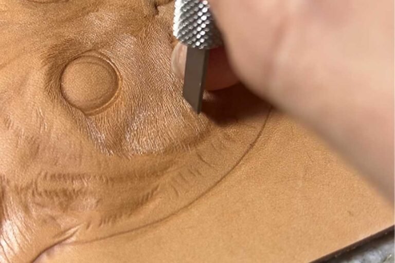 Handmade leather art, showcasing intricate carving knife marks and subtle texture variations, highlighting the unique charm of handcrafted craftsmanship