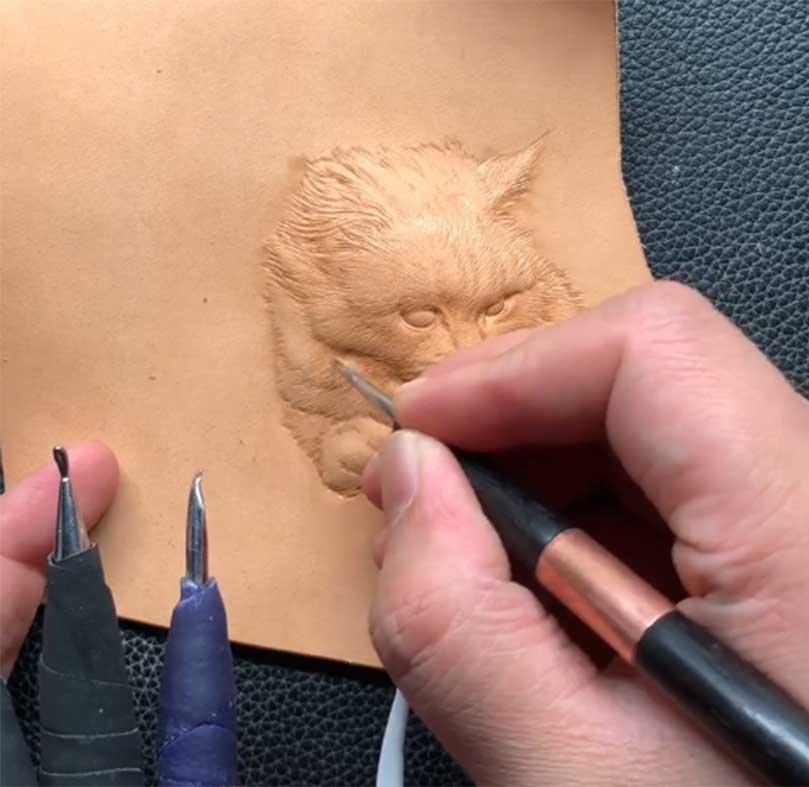 Handmade leather carving of pet custom gifts, showcasing intricate details and emotional warmth, emphasizing the unique charm of handcrafted artistry.